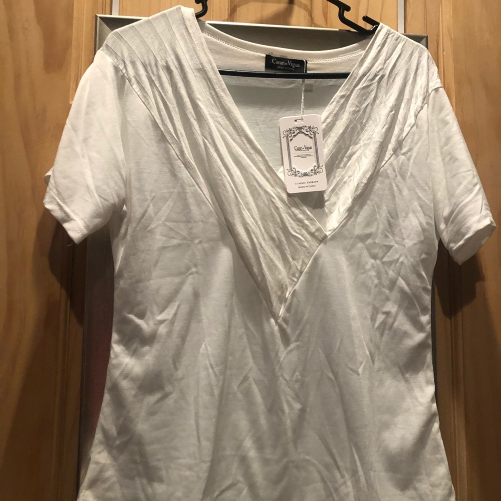 NEW tee